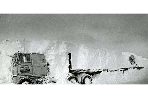 Semi stuck in a huge snow drift