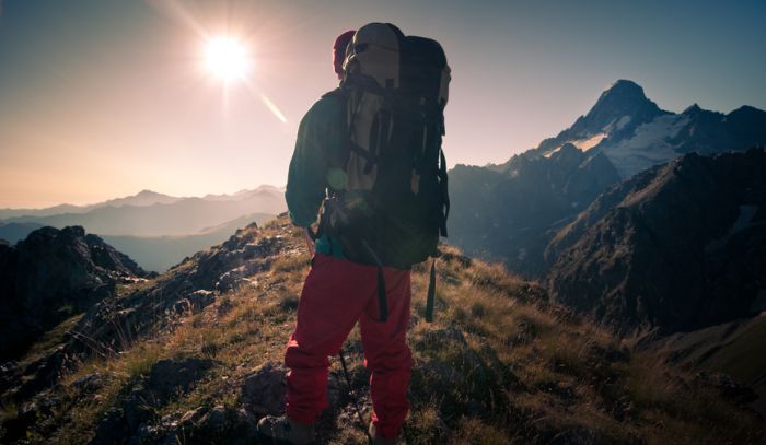 man hiking in a mountain